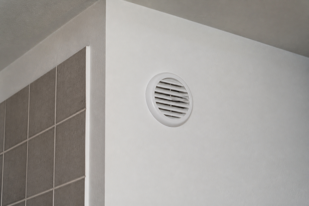 bouche ventilation murale blanche grille circulaire salle